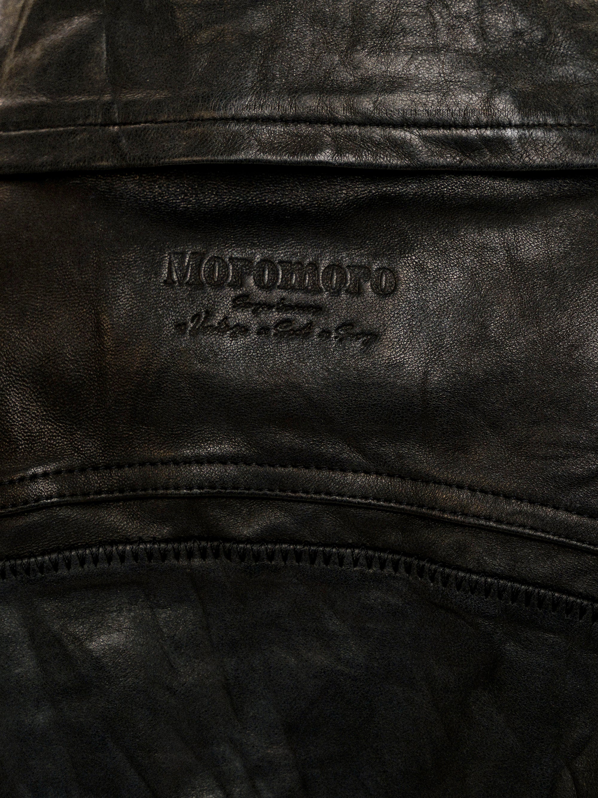 *Pleated slim-fit motorcycle leather jacket