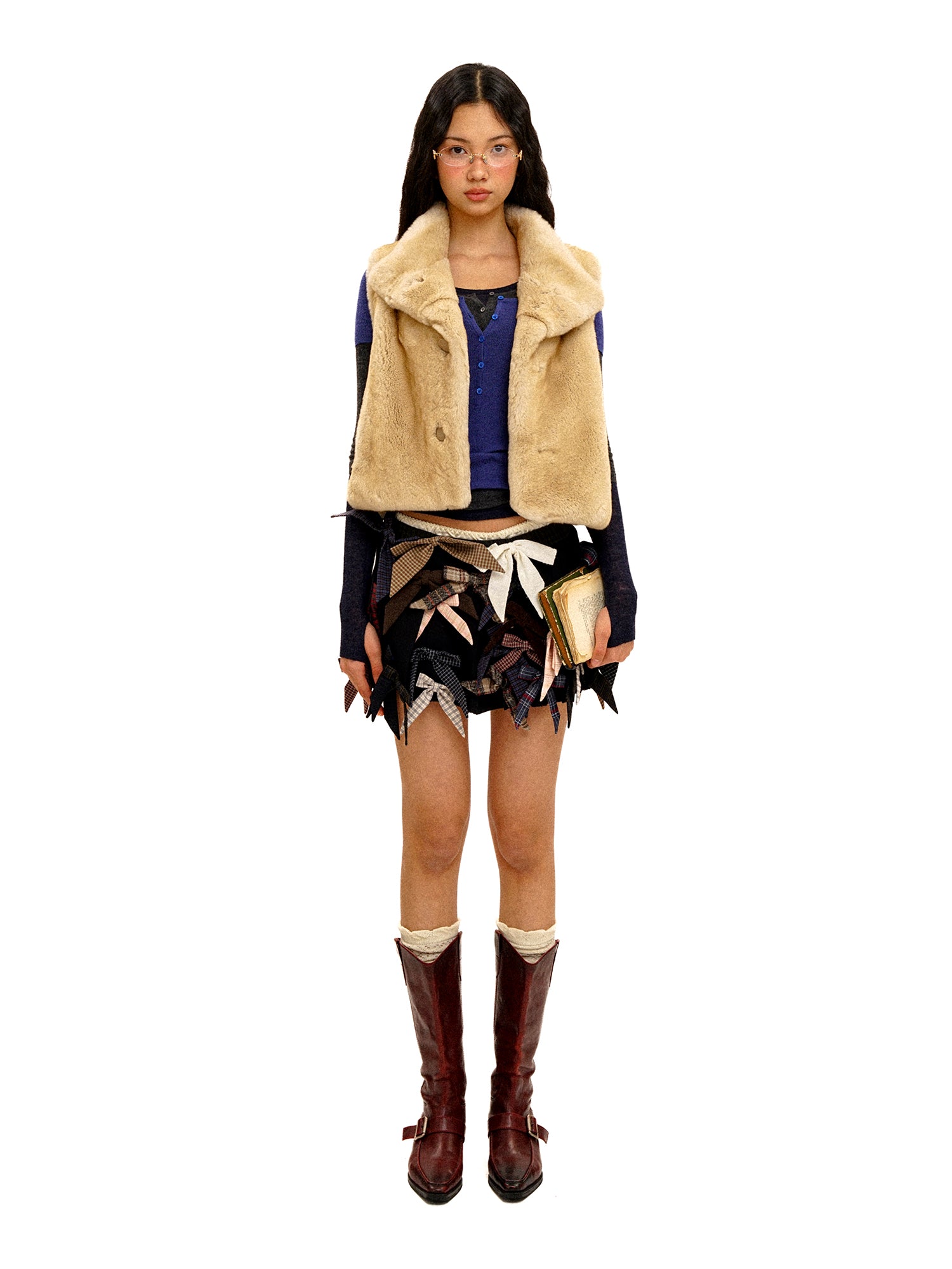 *Multi-bow pleated mini skirt