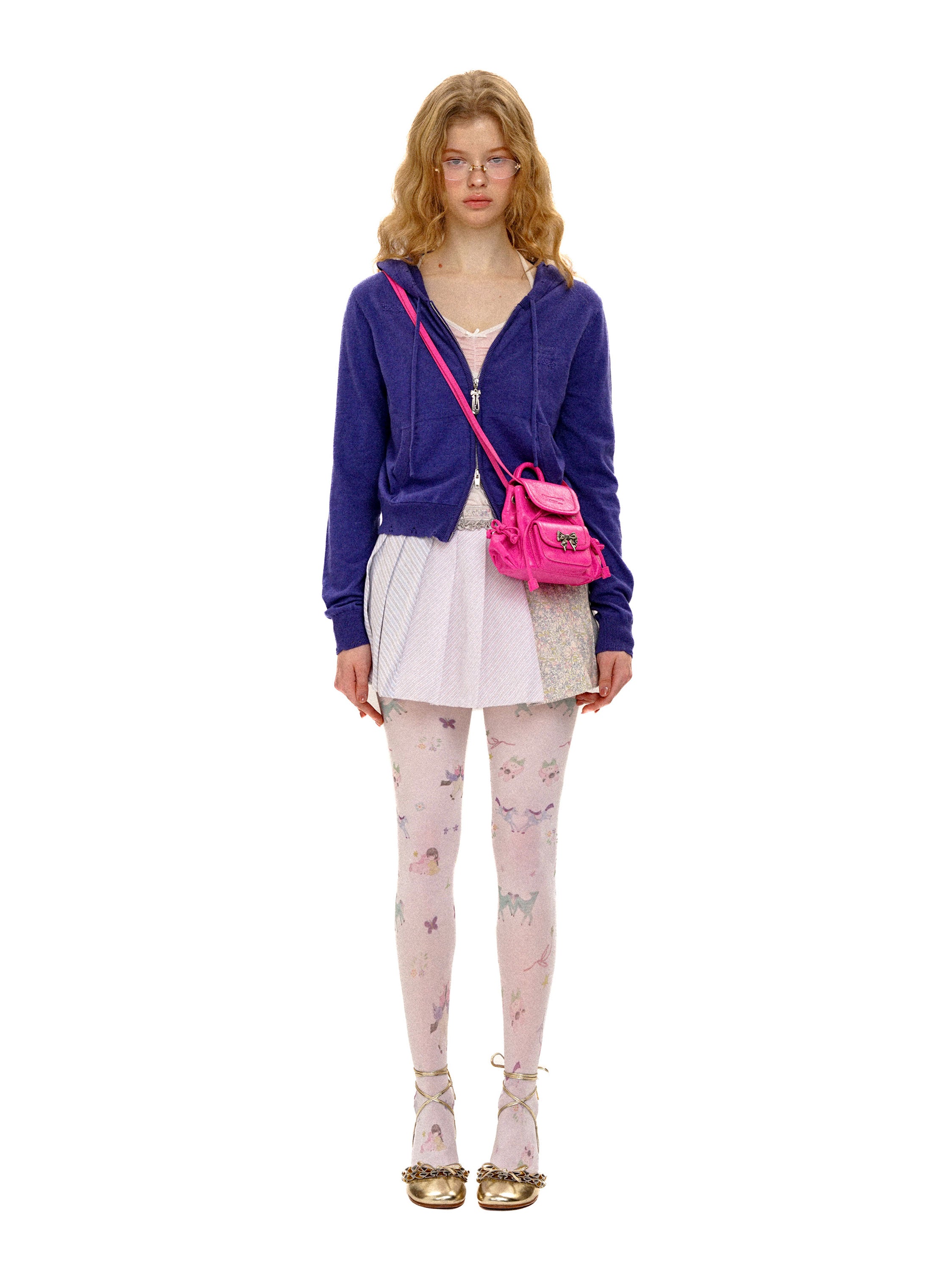 *Pleated mini skirt with ruffled trim