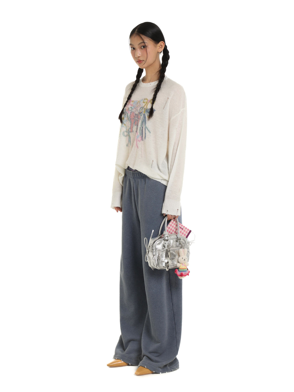 *Bow-tie round neck sweater