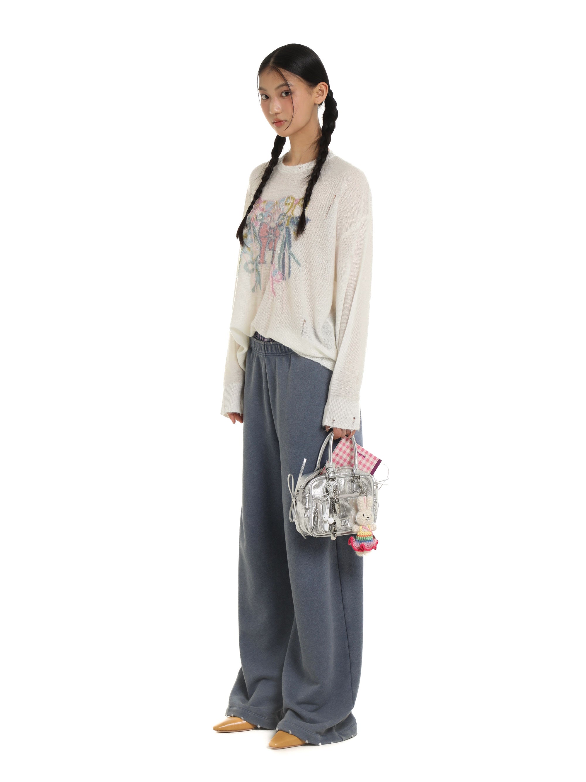 *Bow-tie round neck sweater