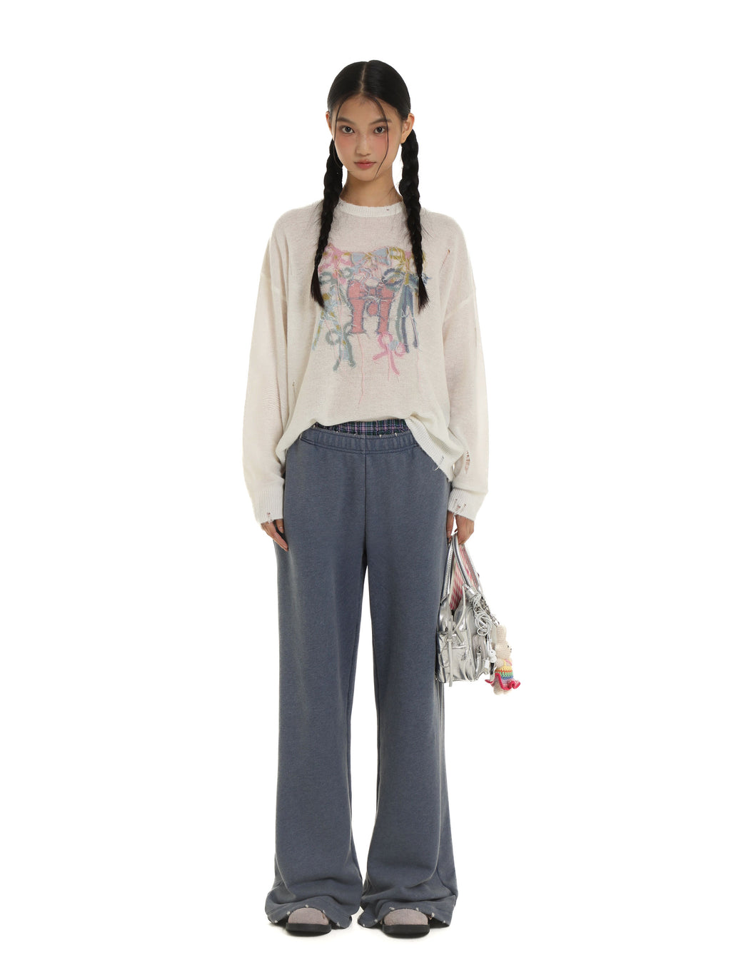 *Bow-tie round neck sweater