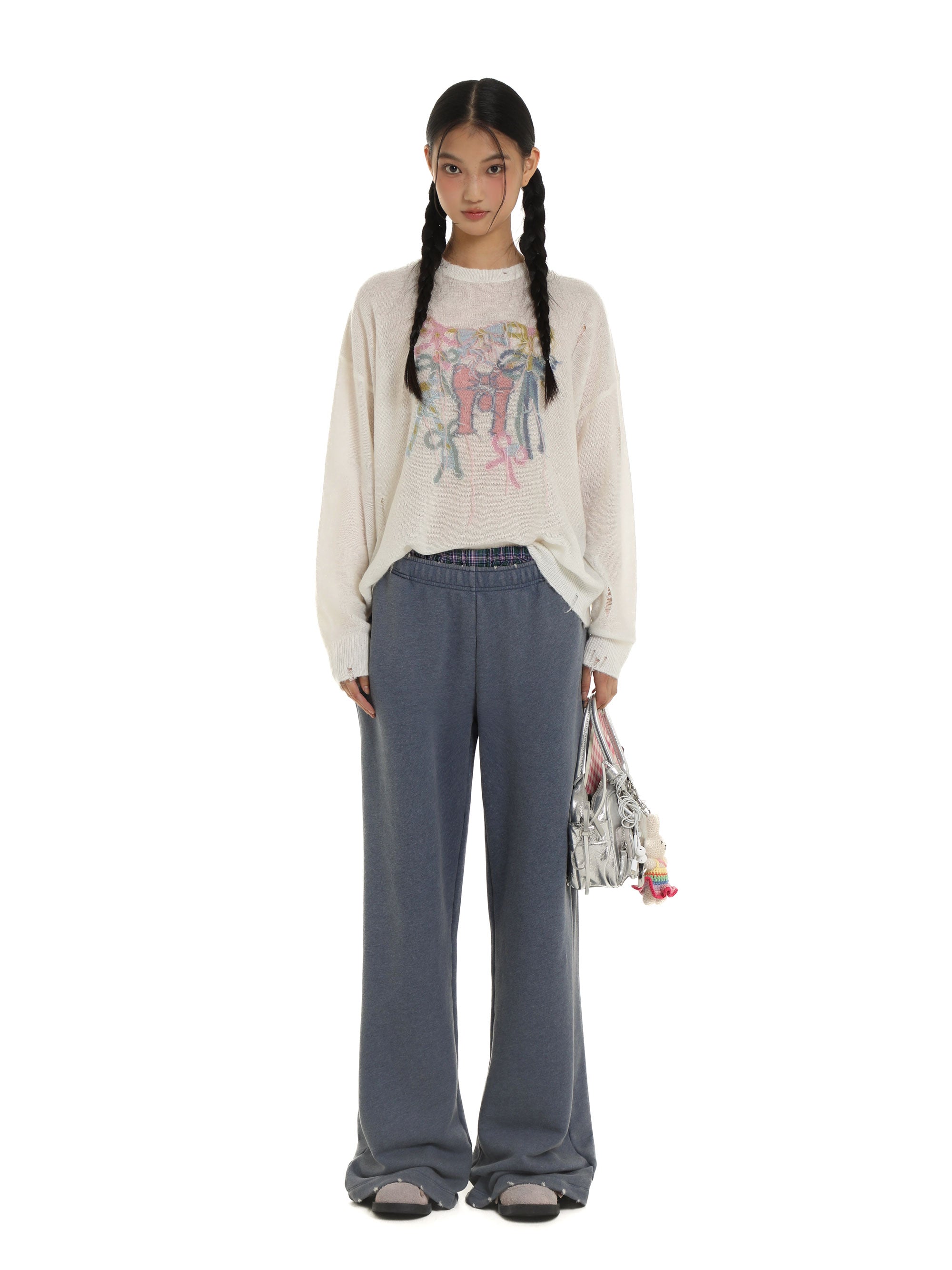 *Bow-tie round neck sweater