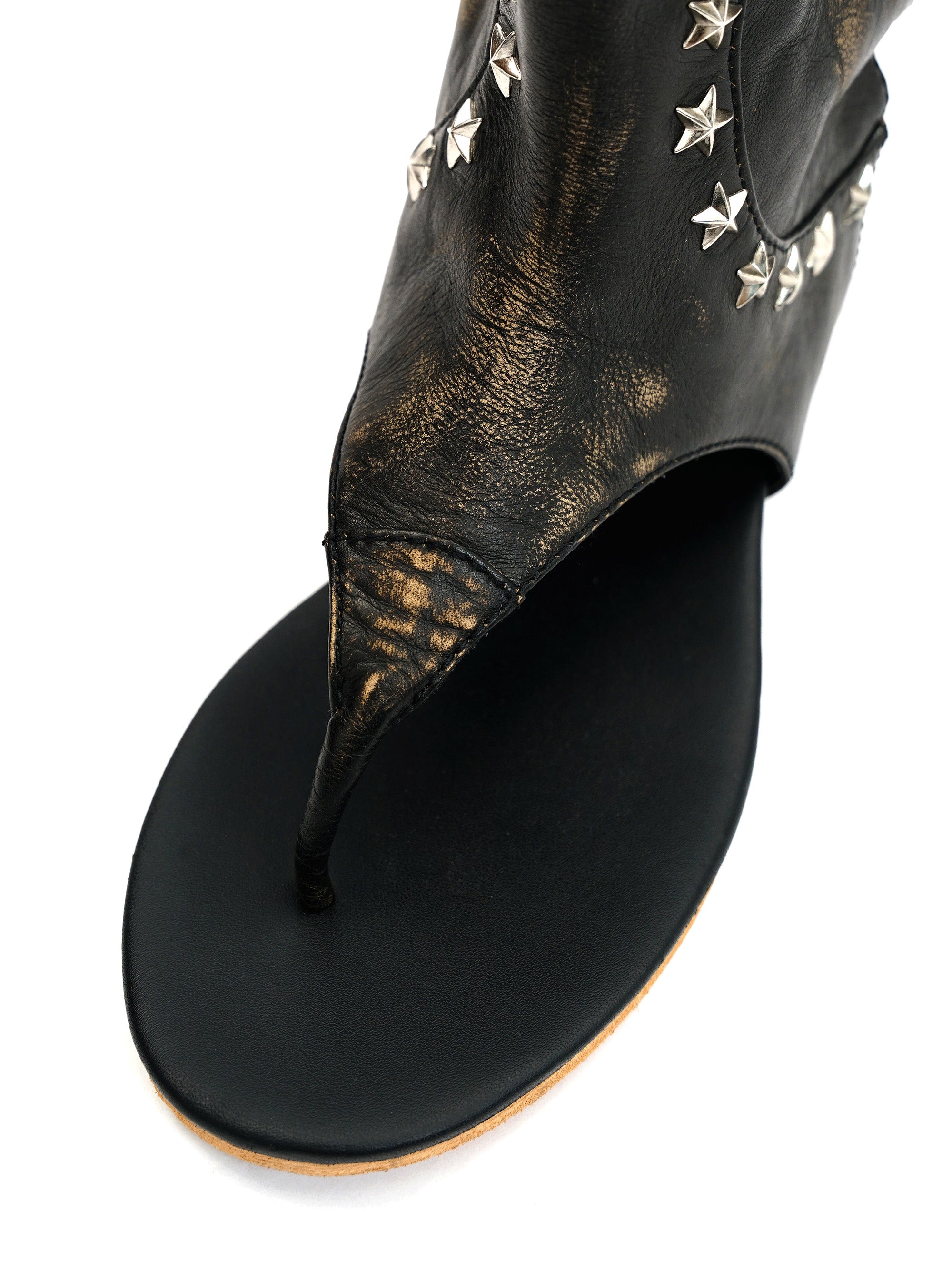 *Stars collide with nail shaped boots