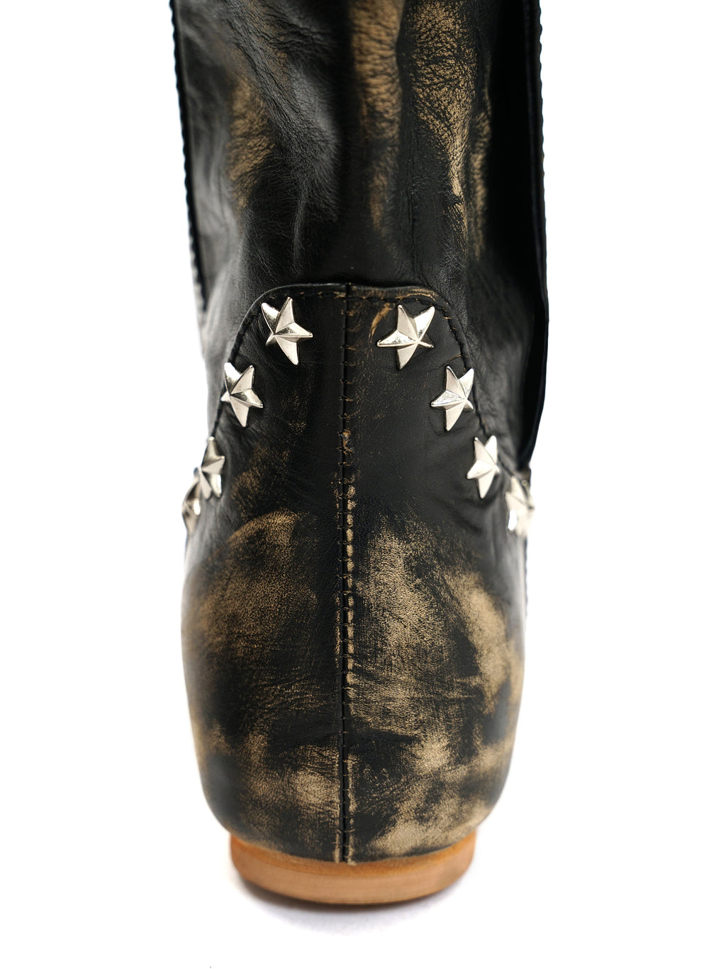 *Stars collide with nail shaped boots